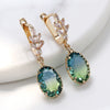 Wholesale Women's Light Luxury Geometric Copper Earrings With Oval Gem And Zircon Inlay And Electroplating Treatment