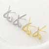 Wholesale Women's Light Luxury Geometric Cross Xshaped Copper Goldplated Zircon Earrings Accessories
