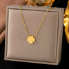 Wholesale Women's Light Luxury Geometric Heartshaped And Fourleaf Clover Stainless Steel Necklace With 18K Real Gold Plating