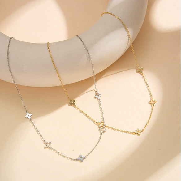 Wholesale Women's Light Luxury Geometric Silver Electroplated Cross Chain Necklace With Four Leaf Clover Pendant