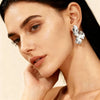 Wholesale Women's Light Luxury Geometric Stainless Steel Electroplated Pleated Petal Flower Earrings