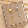 Wholesale Women's Light Luxury Geometric Titanium Steel Cross Chain Necklace With Copper Inlaid Zircon Pendant And Real Gold Plating