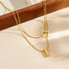Wholesale Women's Light Luxury Goldplated Stainless Steel Geometric Snake Bone Chain Necklace With Square And Cylindrical Pendant