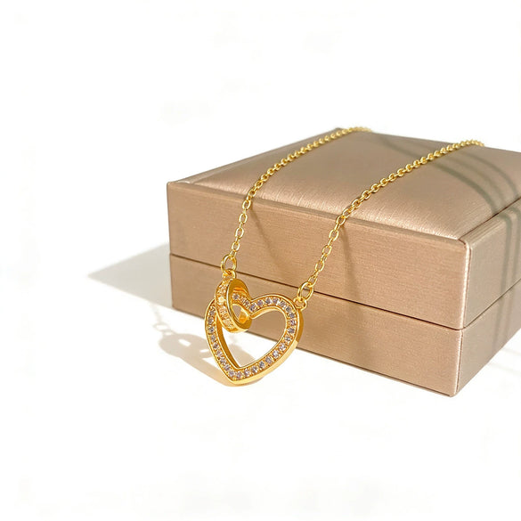 Wholesale Women's Light Luxury Heart Shaped Zircon Inlaid Titanium Steel And Gold Plated Copper Necklace With Oshaped Chain