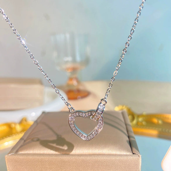Wholesale Women's Light Luxury Heart Shaped Zircon Inlaid Titanium Steel And Gold Plated Copper Necklace With Oshaped Chain