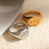 Wholesale Women's Light Luxury Niche Style Geometric Stainless Steel 18K Goldplated English Letter Oval Ring