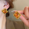 Wholesale Women's Light Luxury Resin Earrings With Geometric Heart Design And Electroplating