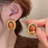 Wholesale Women's Light Luxury Resin Earrings With Geometric Heart Design And Electroplating