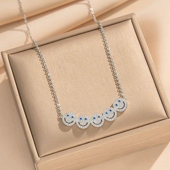 Wholesale Women's Light Luxury Smiley Face Electroplated Titanium Steel And Copper Necklace And Earrings Set