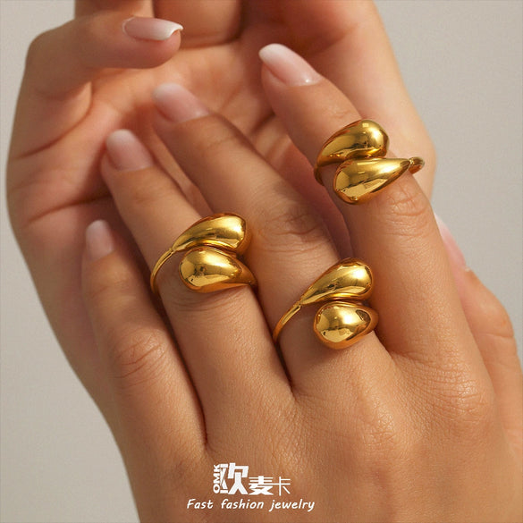 Wholesale Women's Light Luxury Stainless Steel Geometric Hollow Opening Comma Drop Tail Ring Electroplated With 18K Gold