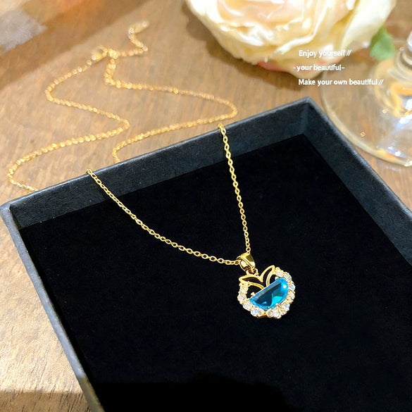 Wholesale Women's Light Luxury Style Fish Tail Pattern Zircon Inlaid Titanium Steel And Copper Pendant Necklace With Oshaped Chain