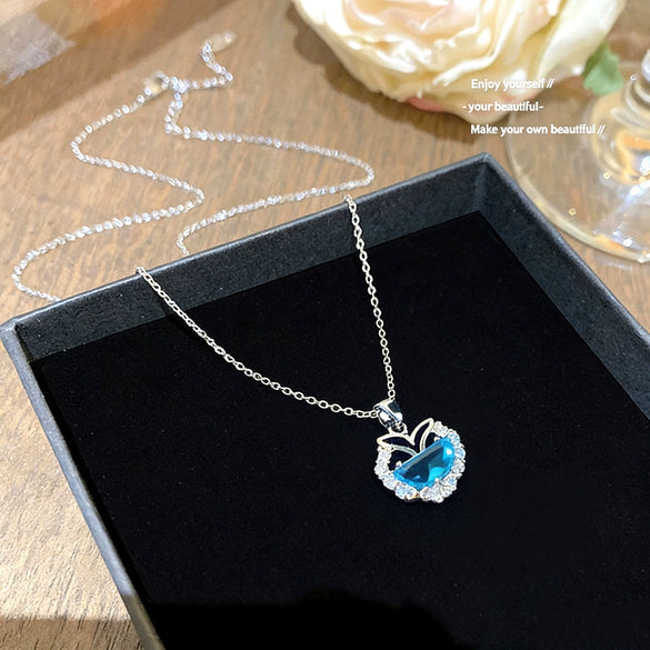 Wholesale Women's Light Luxury Style Fish Tail Pattern Zircon Inlaid Titanium Steel And Copper Pendant Necklace With Oshaped Chain