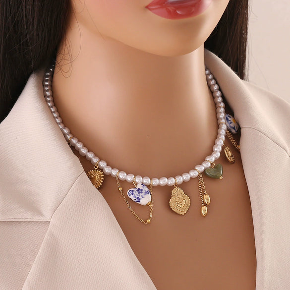 Wholesale Women's Light Luxury Style Stainless Steel Pearl Strand Necklace With Real Gold Plated Heart Shape Titanium Steel Pendant