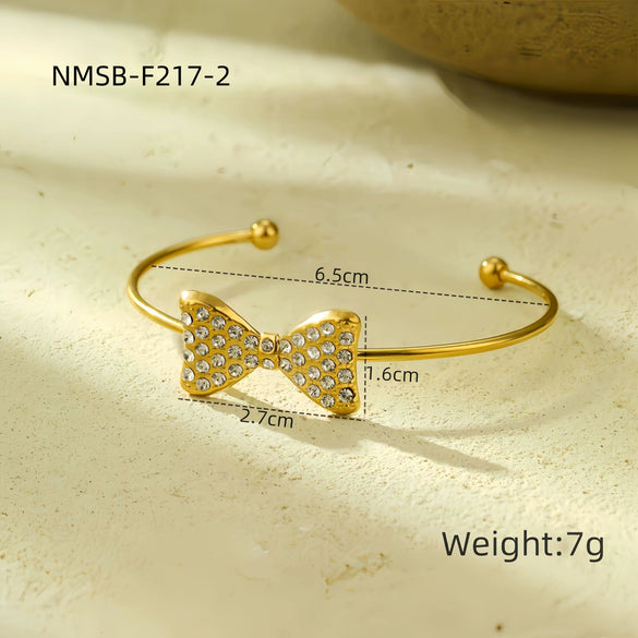 Wholesale Women's Light Luxury Titanium Steel And Stainless Steel Bow Tie Earrings Necklace Ring Set With Electroplating