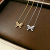 Wholesale Women's Light Luxury Titanium Steel Oshaped Chain Necklace With Copper Pendant Inlaid With Zircon In Bowknot Shape