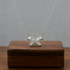 Wholesale Women's Light Luxury Titanium Steel Oshaped Chain Necklace With Copper Pendant Inlaid With Zircon In Bowknot Shape