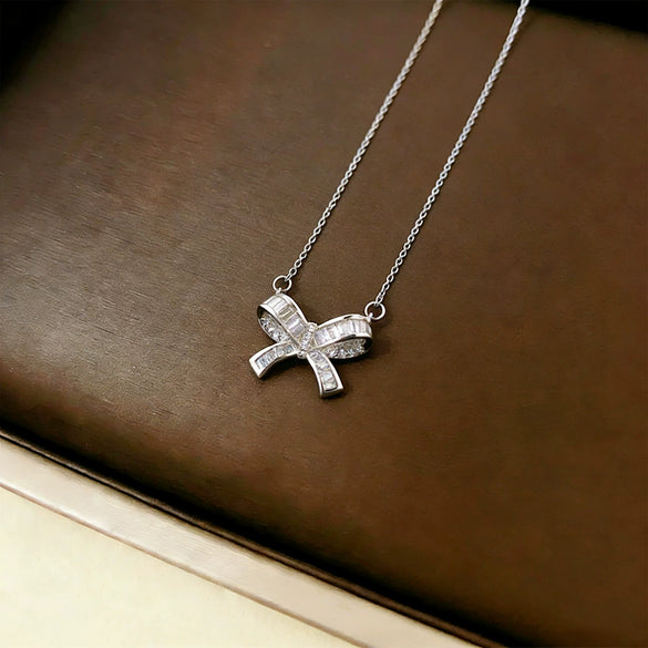 Wholesale Women's Light Luxury Titanium Steel Oshaped Chain Necklace With Copper Pendant Inlaid With Zircon In Bowknot Shape