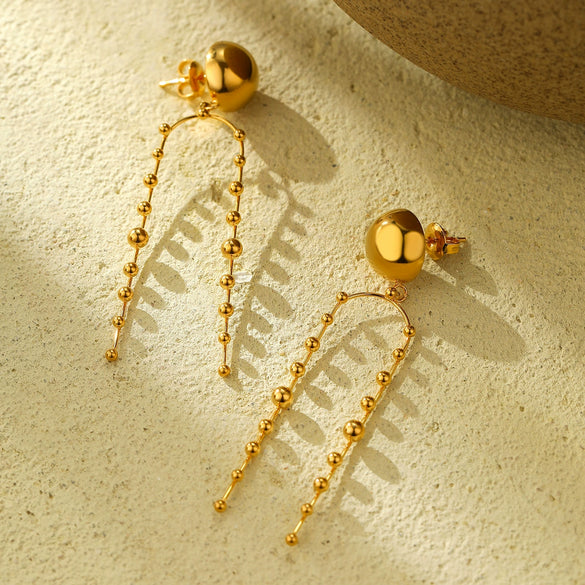 Wholesale Women's Light Luxury Titanium Steel Round Bead Tassel Earrings With Electroplating