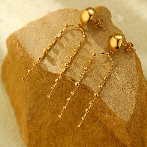 Wholesale Women's Light Luxury Titanium Steel Round Bead Tassel Earrings With Electroplating