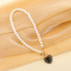 Wholesale Women's Love Letter Vintage Pearl Necklace Alloy Heart Pendant With Ball Chain Electroplated