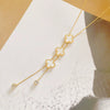 Wholesale Women's Lucky Clover Tassel Pendant Necklace In Titanium Steel With Leaf Pattern And Electroplating