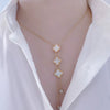 Wholesale Women's Lucky Clover Tassel Pendant Necklace In Titanium Steel With Leaf Pattern And Electroplating