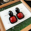 Wholesale Women's Maillard Style Alloy Geometric Tiger Eye Earrings With Electroplating