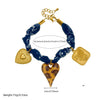 Wholesale Women's Maillard Style Dark Blue Leopard Print Stainless Steel Goldplated Heartshaped Embossed Pendant Bracelet