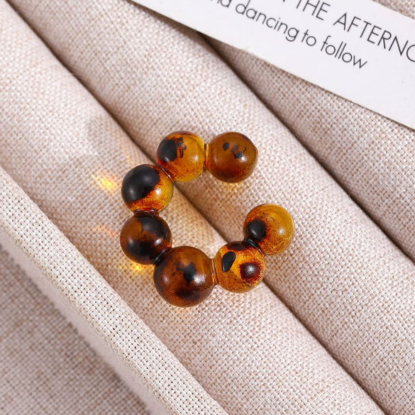 Wholesale Women's Maillard Style Geometric Leopardprint Resin Cshaped Electroplated Ear Clips