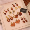 Wholesale Women's Maillard Style Geometric Tiger Eye Real Gold Plated Titanium Steel Earrings