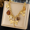 Wholesale Women's Maillard Style Gold Plated Stainless Steel Insect Heart Flower Pendant Oshaped Chain Necklace