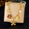 Wholesale Women's Medieval Style Stainless Steel Necklace With Gold Plated Flower Leopard Print Heart And Square Hollow Pendant And Flash O Chain