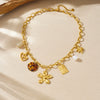 Wholesale Women's Medieval Style Stainless Steel Necklace With Gold Plated Flower Leopard Print Heart And Square Hollow Pendant And Flash O Chain