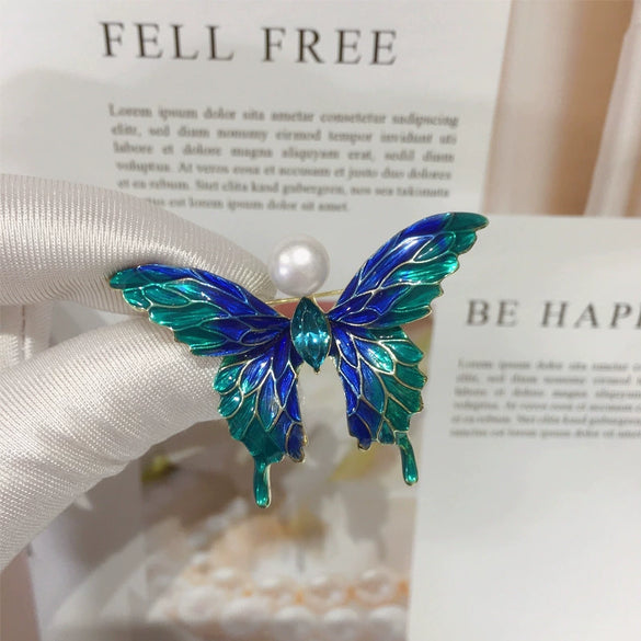 Wholesale Women's Minimalist Alloy Natural Pearl And Freshwater Pearl Brooch With Sapphire Blue Butterfly Design And Electroplating Finish