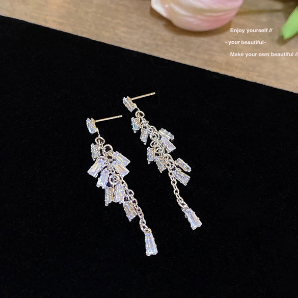 Wholesale Women's Minimalist Geometric Copper Zircon Tassel Long Stud Earrings With 925 Silver Needle And Electroplating