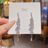 Wholesale Women's Minimalist Geometric Copper Zircon Tassel Long Stud Earrings With 925 Silver Needle And Electroplating