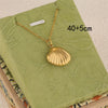 Wholesale Women's Minimalist Geometric Stainless Steel And 18K Gold Electroplated Scallop Shell Pendant Cross Chain Necklace