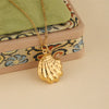 Wholesale Women's Minimalist Geometric Stainless Steel Cross Chain Necklace With 18K Gold Electroplated Conch Pendant
