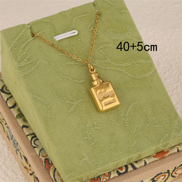 Wholesale Women's Minimalist Geometric Stainless Steel 18K Gold Plated Perfume Bottle Pendant Necklace With Cross Chain
