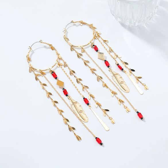 Wholesale Women's Minimalist Geometric Zinc Alloy Exaggerated Tassel Feather Multilayer Earrings With Electroplating