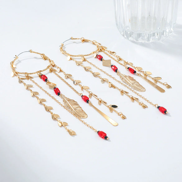 Wholesale Women's Minimalist Geometric Zinc Alloy Exaggerated Tassel Feather Multilayer Earrings With Electroplating
