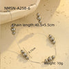 Wholesale Women's Multilayer Imitation Black Pearl Stainless Steel Stacked Geometric Wind Necklace With Electroplating