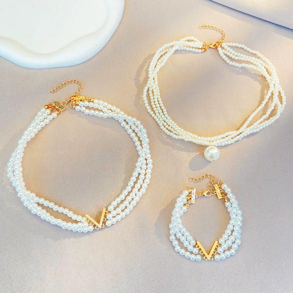 Wholesale Women's Multilayer Imitation Pearl Geometric Clavicle Chain Necklace With Letter Pattern And Electroplating Design