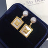 Wholesale Women's Natural Freshwater Pearl Earrings With Alloy Inlaid Artificial And Semiprecious Stones Flat Round And Bun Round Shape Fashion Retro Style