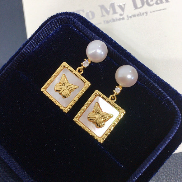 Wholesale Women's Natural Freshwater Pearl Earrings With Alloy Inlaid Artificial And Semiprecious Stones Flat Round And Bun Round Shape Fashion Retro Style