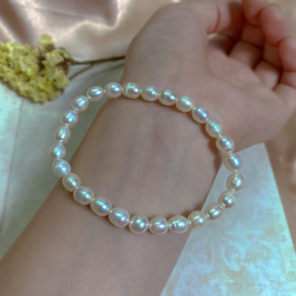 Wholesale Women's Natural Freshwater Pearl Stretch Bracelet With Elastic Cord Nearly Round Shape Simple Style