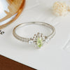 Wholesale Women's Natural Peridot Eyes Pattern Polished Electroplated 925 Silver Ring