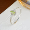 Wholesale Women's Natural Peridot Eyes Pattern Polished Electroplated 925 Silver Ring