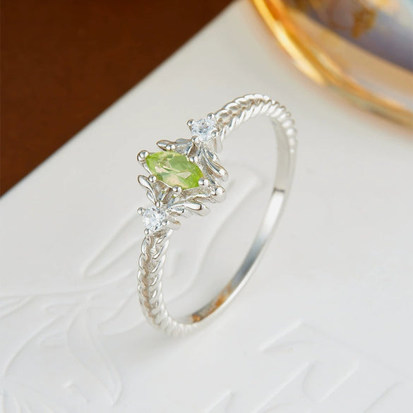 Wholesale Women's Natural Peridot Eyes Pattern Polished Electroplated 925 Silver Ring
