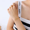 Wholesale Women's Natural Style 316L Stainless Steel Love Footprint Heart Bracelet With 18K Gold Plated Electroplating